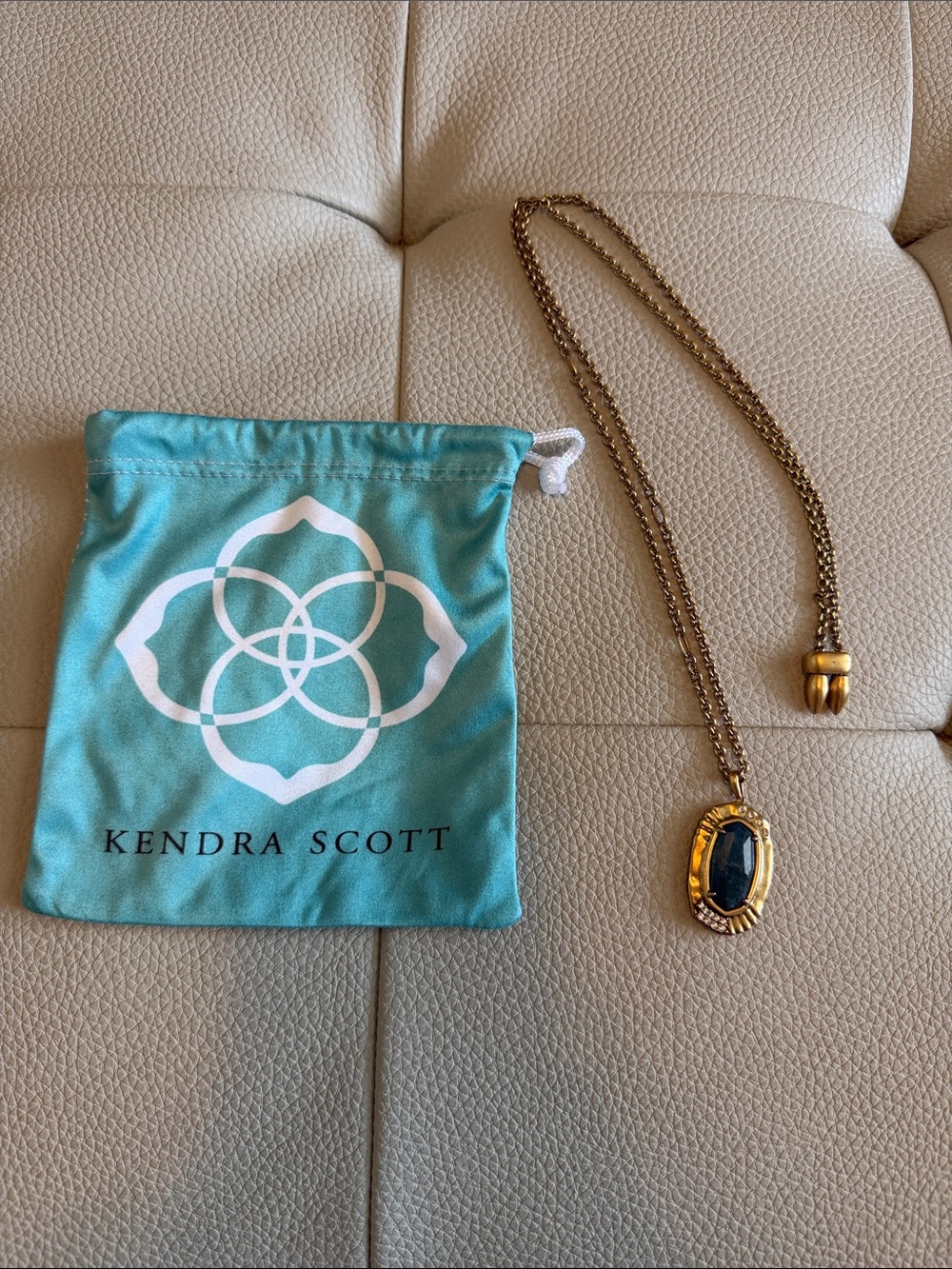Kendra Scott Gold Necklace with Dark Blue Stone Pendant
